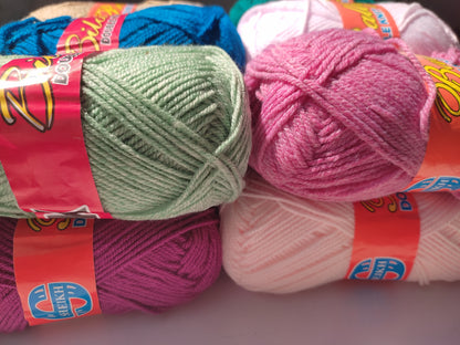 Premium double knit yarn in a wide range of colors including white, pink, teal, dark green, blue, purple and beige
